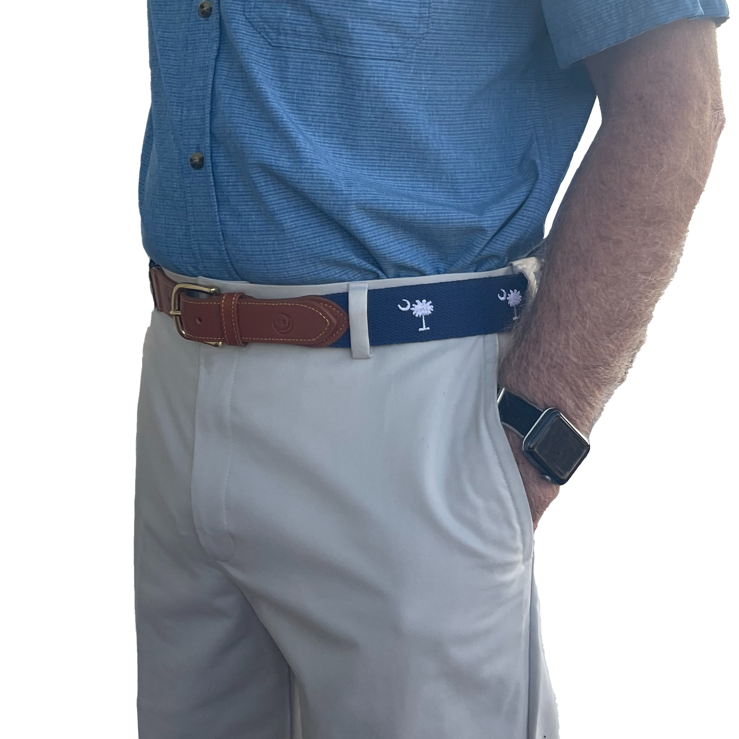 Person wearing a blue shirt, gray pants, and a belt with sc state flag design palmetto tree and moon