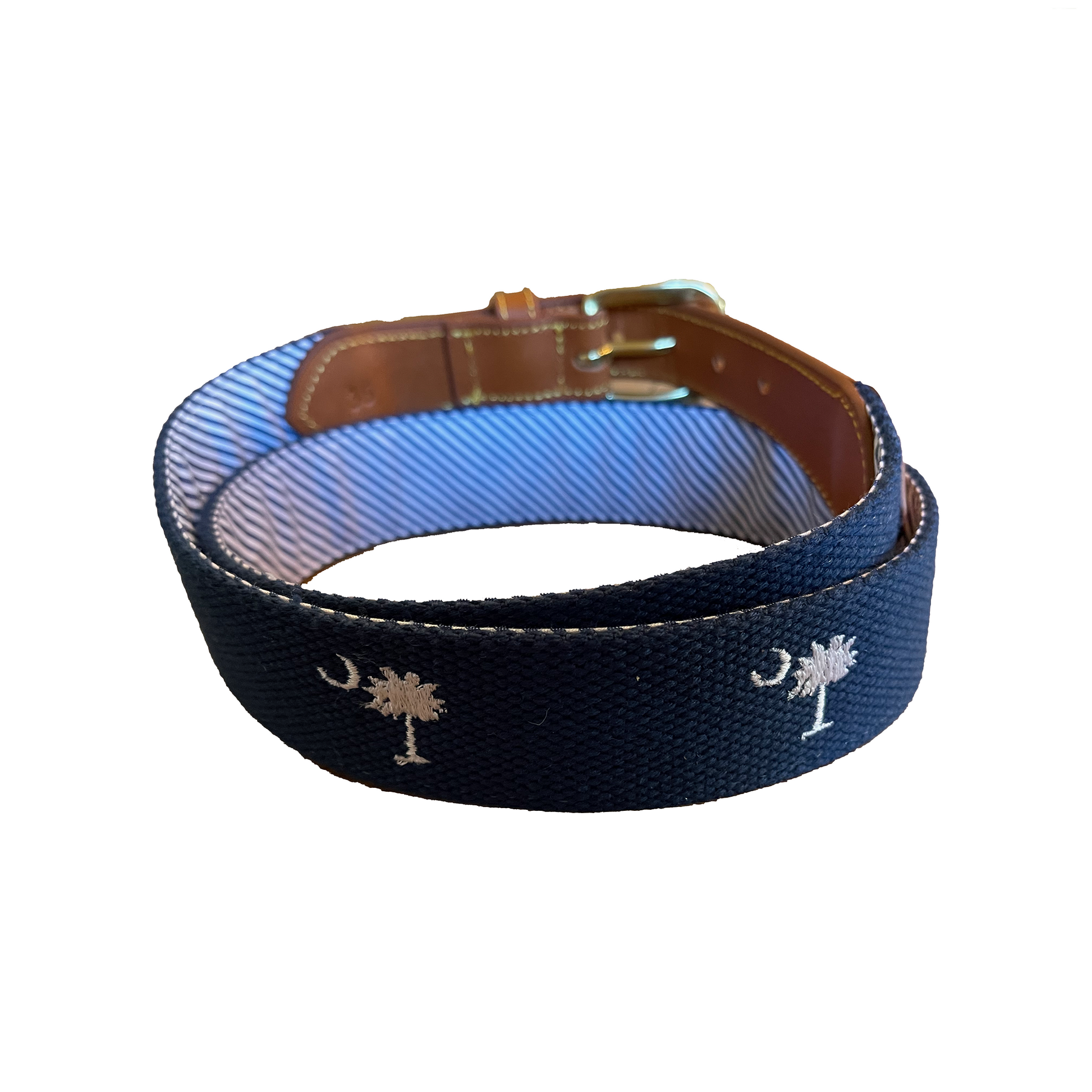 palmetto moon navy blue web belt showing interior lining of belt in blue with white stripes and genuine leather tabs