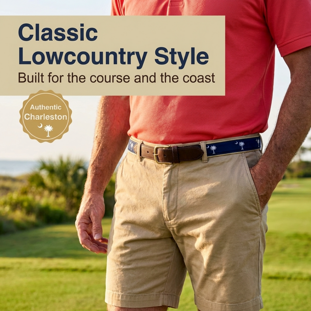 A man wearing a coral red polo shirt, beige lowcountry style shorts, and a blue patterned belt stands on a golf course. Text overlays read 'Classic Lowcountry Style' and 'Built for the course and the coast' with an 'Authentic Charleston' badge.
