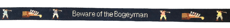Golf belt layout featuring golf clubs and golfer on navy blue background.